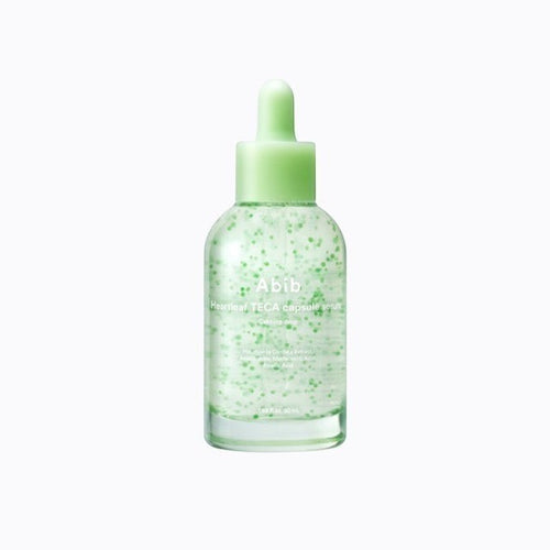 Best Friend Beauty Abib Heartleaf Teca Capsule Facial Serum in a clear glass bottle with visible green active capsules.