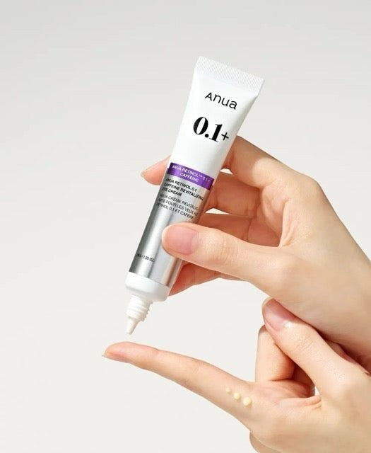 Best Friend Beauty Anua Retinol 0.1 Caffeine Revitalizing Eye Cream being squeezed onto a finger